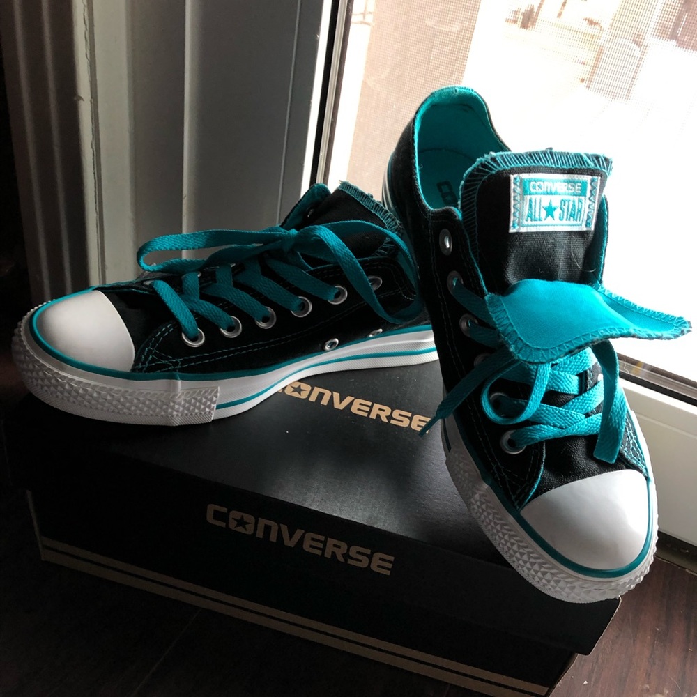 Blue and black converses